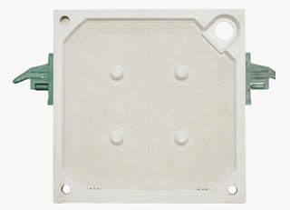 Chamber filter plate has a feed hole in the upper right